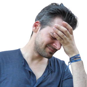 Main holding head in hands, suffering with a headache